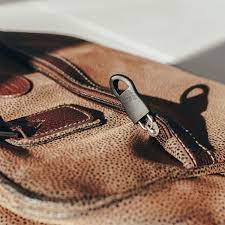 Changement-fermeture-eclair-pour-valise-90-DH.jpg Changement fermeture éclair pour valise